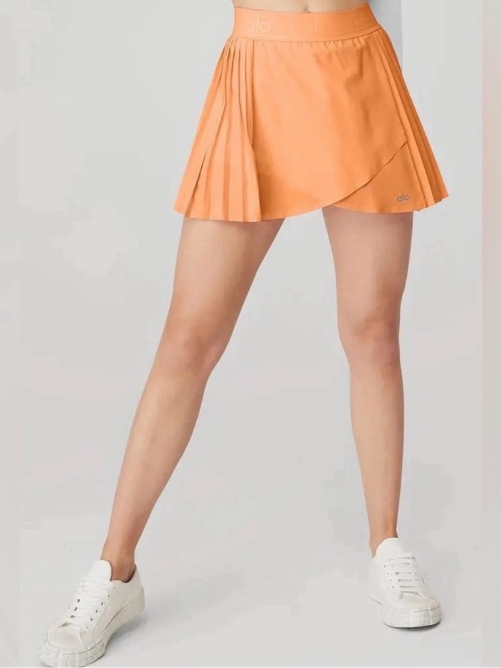 ALO Yoga Orange Pleated Wrap Mini Skort